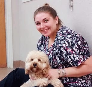 Veterinary Career Opportunities in Shrewsbury: Veterinarian Sitting With Dog
